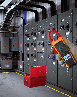 Motor Control Center Troubleshooting in a VR environment, showcasing electrical panels, safety labels, and a toolbox for electrical safety training.